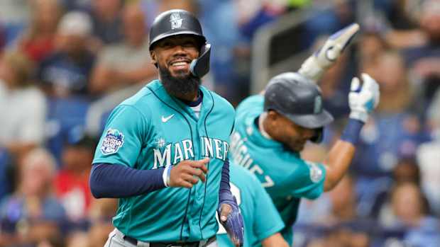 Sep 9, 2023; St. Petersburg, Florida, USA; Seattle Mariners right fielder Teoscar Hernandez (35) celebrates after scoring a run against the Tampa Bay Rays in the first inning at Tropicana Field. Mandatory Credit: Nathan Ray Seebeck-USA TODAY Sports